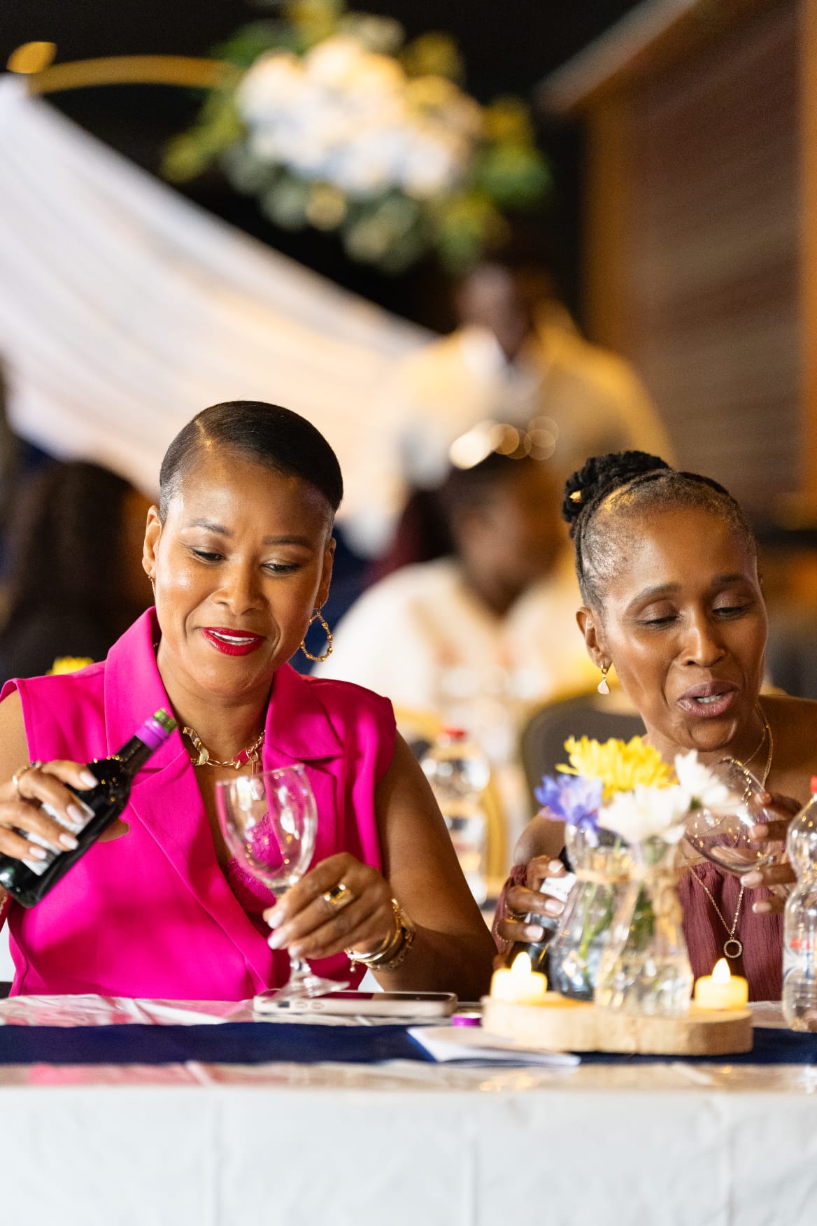 Guests talking at the tables as the evening winds down